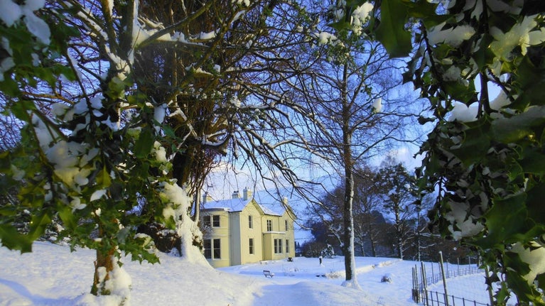 Allan Bank house cloaked in snow in Grasmere